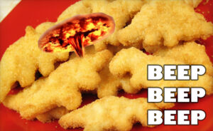 Nuclear hot dinosaur shaped chicken nuggets with microwave beeping